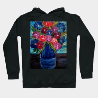 A lovely boutique of abstract vibrant bright colorful  flowers in a tall glass vase Hoodie